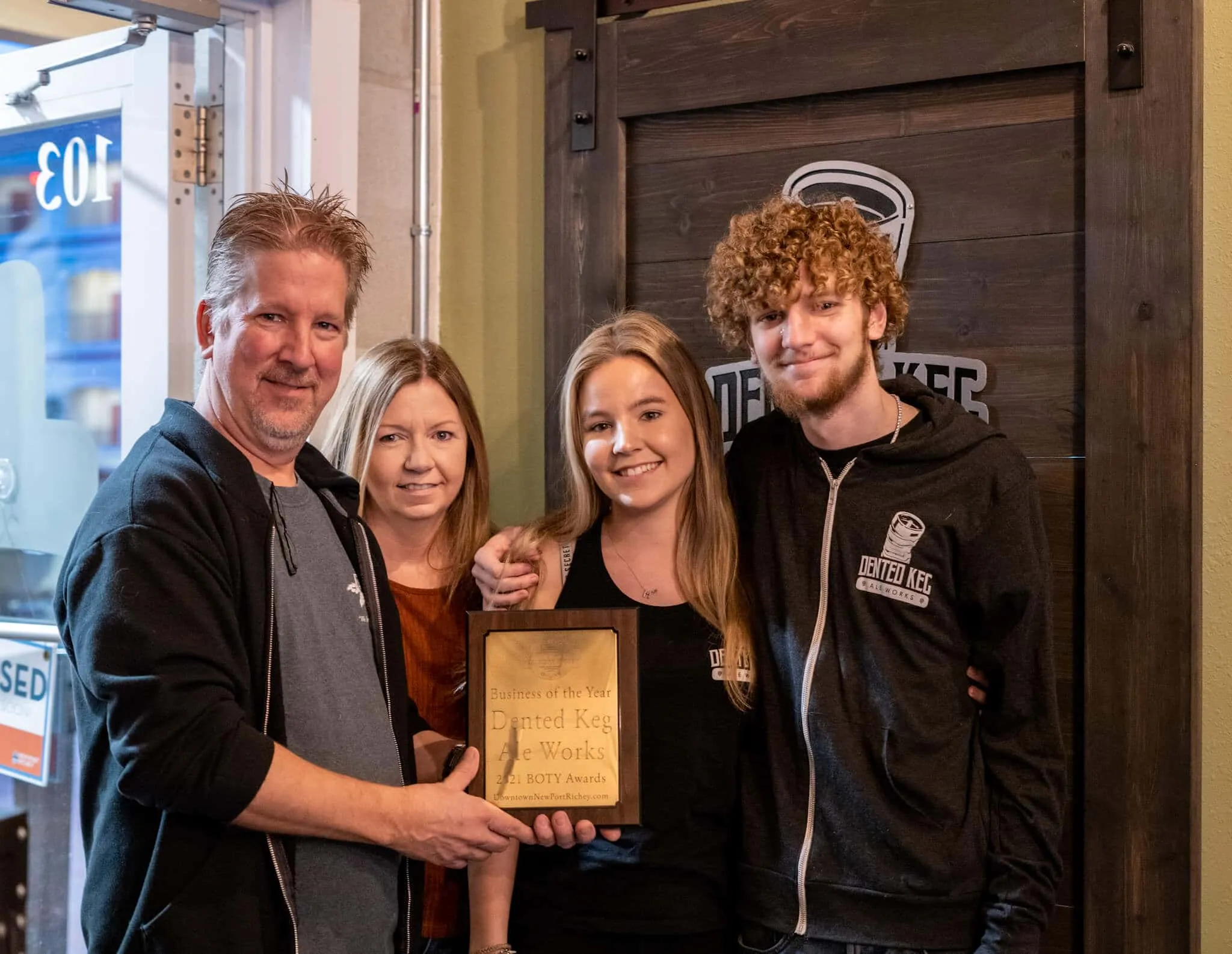 Dented Keg Ale Works family holding Business of the Year award
