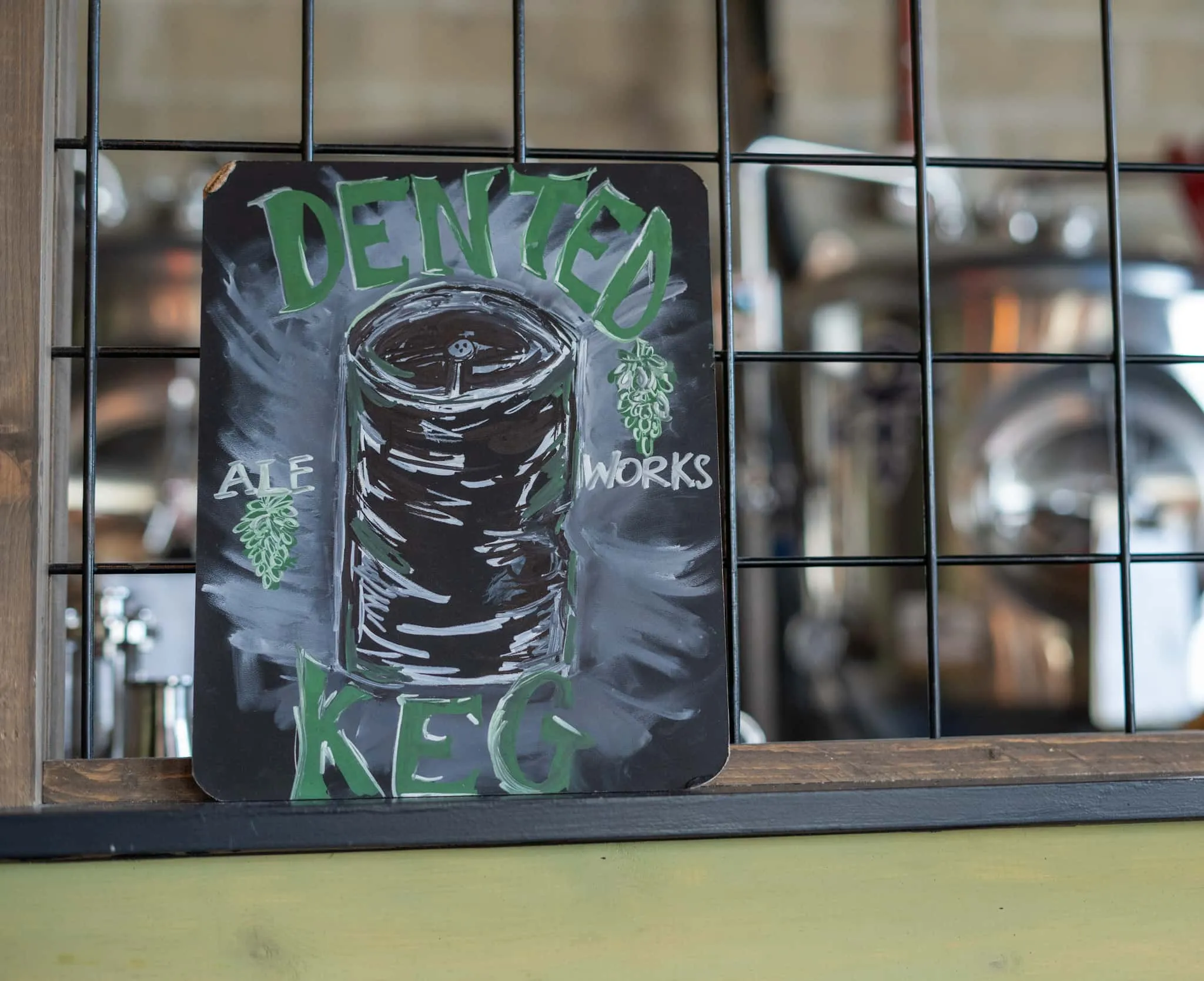 Hand-painted Dented Keg Ale Works chalk sign