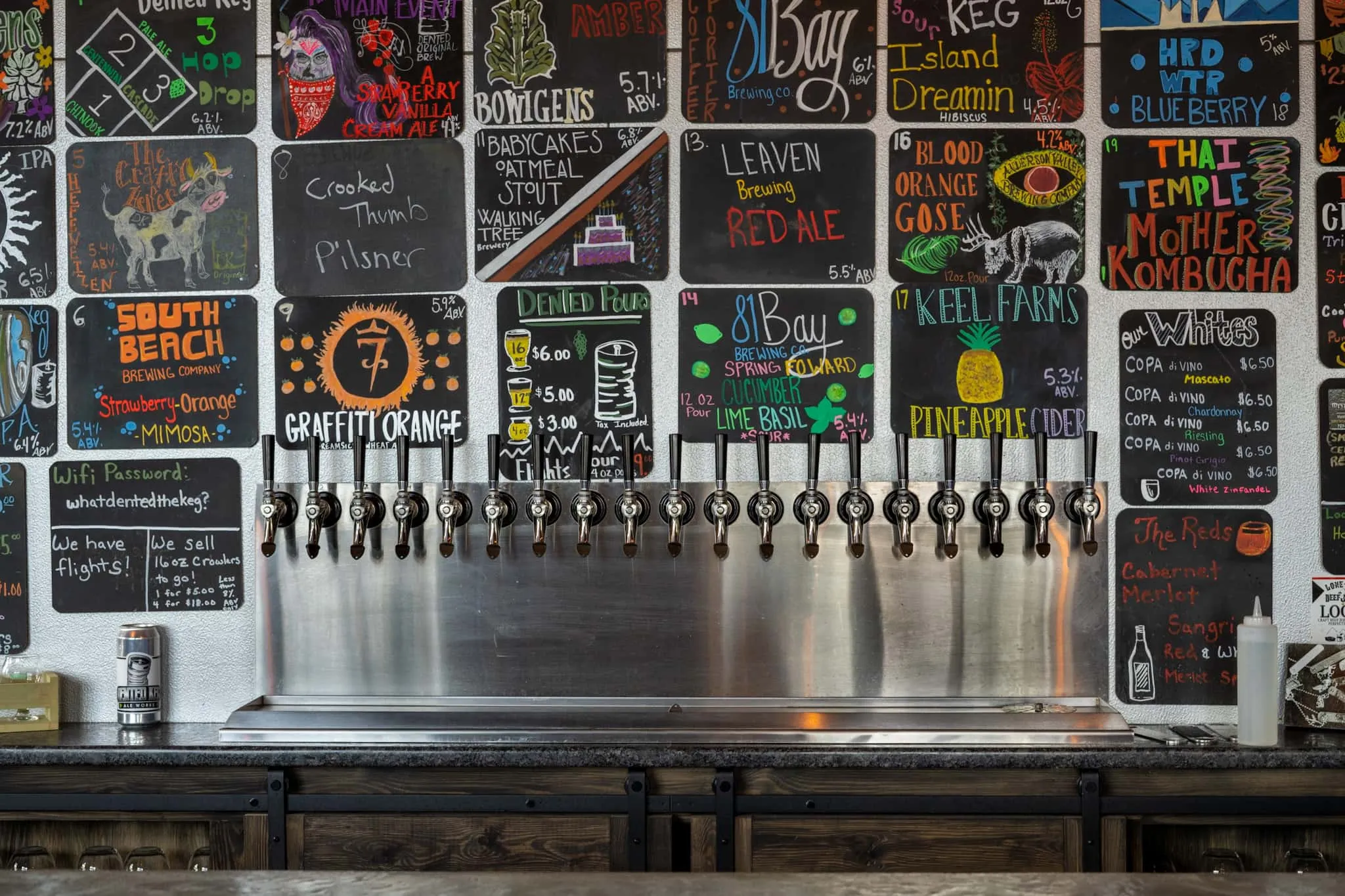 Craft beer tap handles at the Dented Keg bar